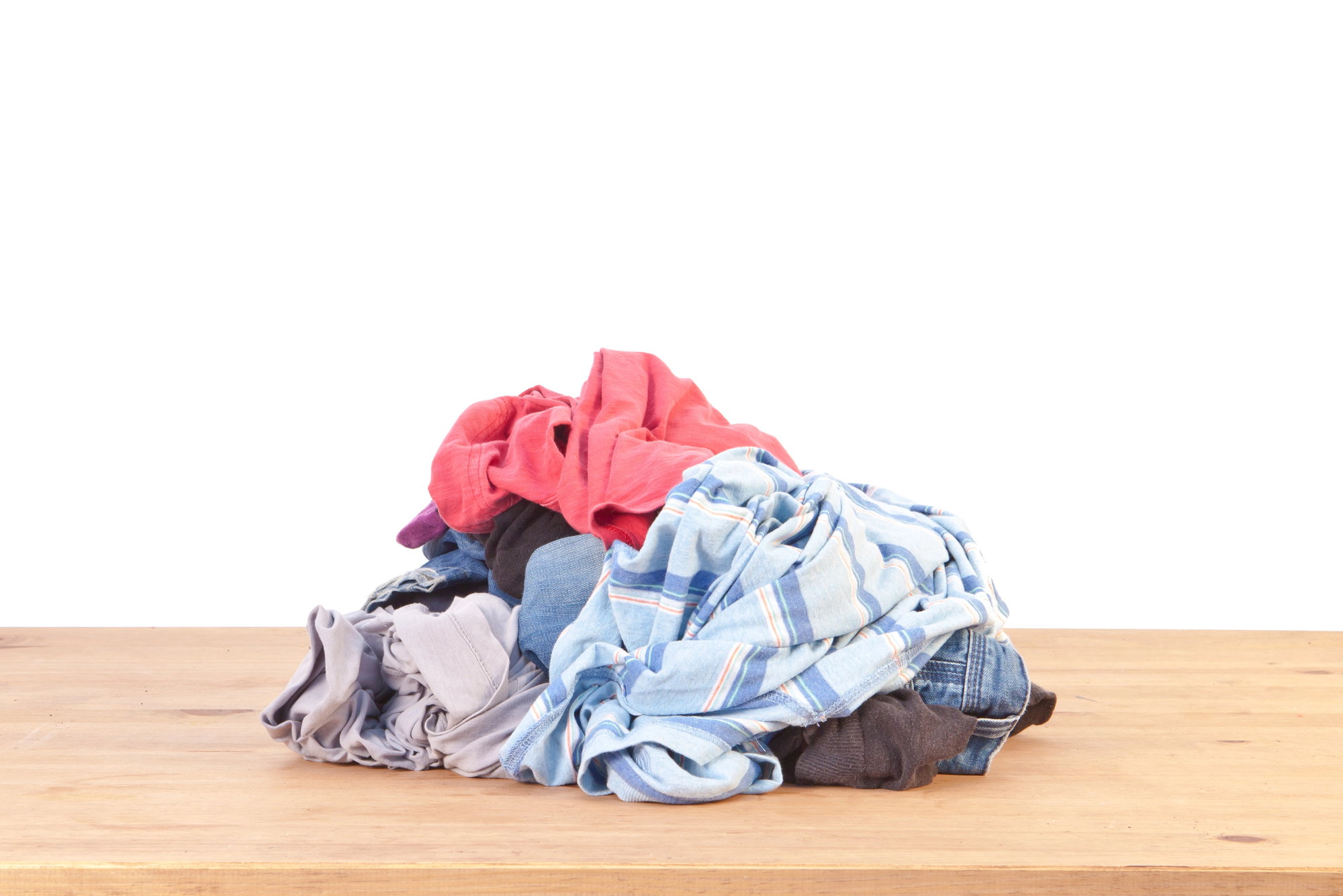 Losing Luggage on Your Family Vacation - Pile of Dirty Clothes