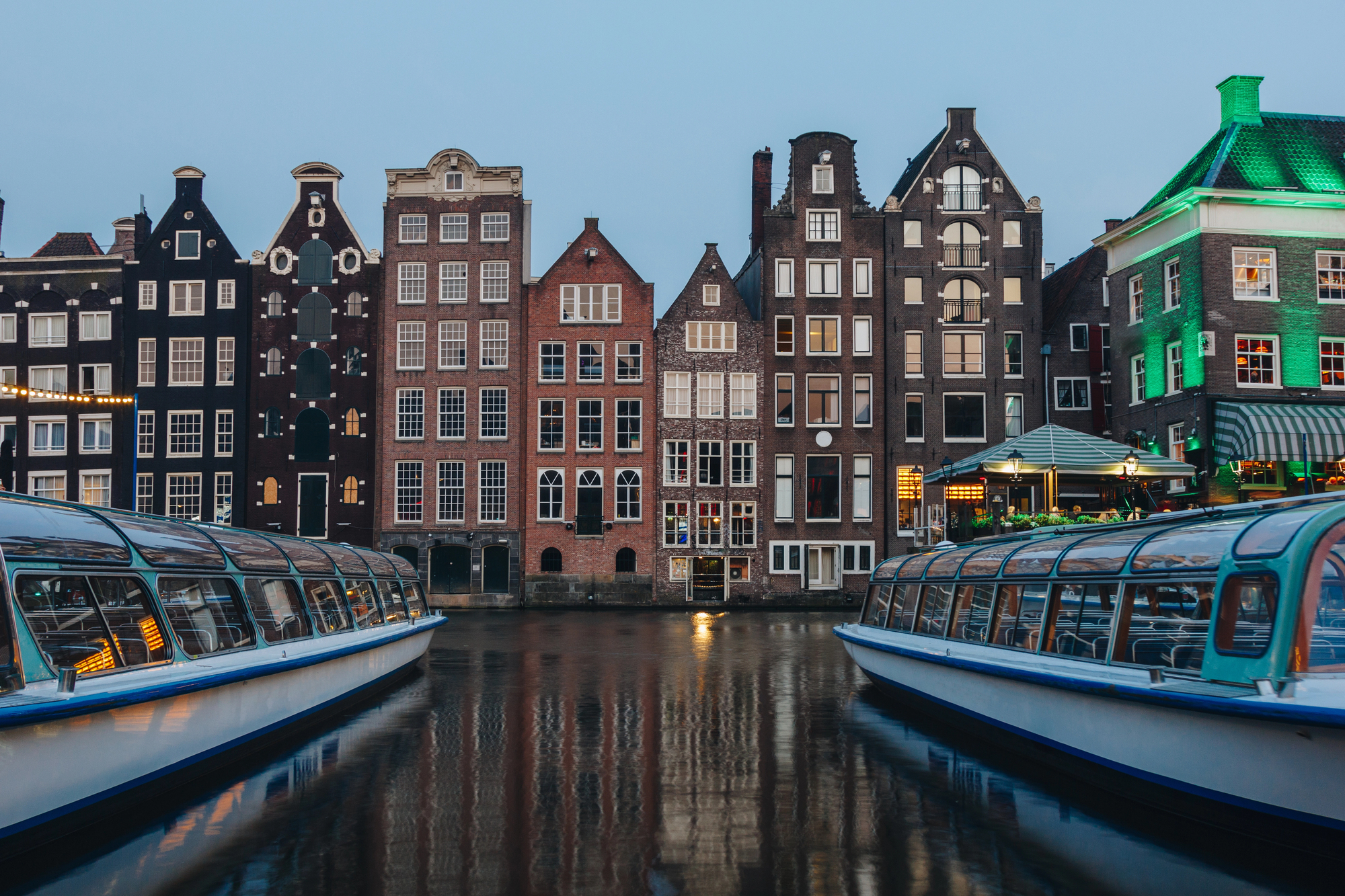 Amsterdam Canals: Everything to Know for Your Family Vacation - Glass Top Boat on a Canal in Amsterdam