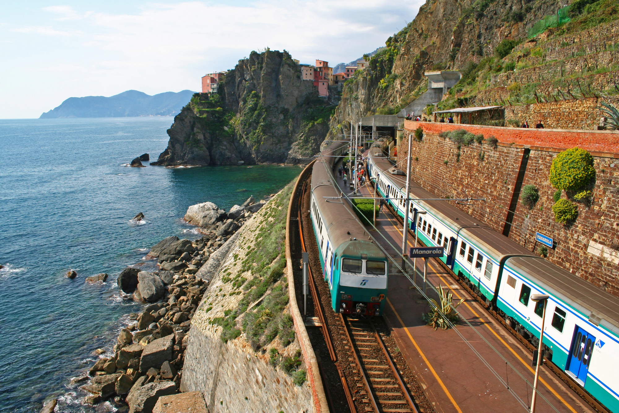 Luxury Family Train Travel in Europe: How to Create the Multigenerational Journey of a Lifetime - Train at Station Manarola in Cinque Terre Italy