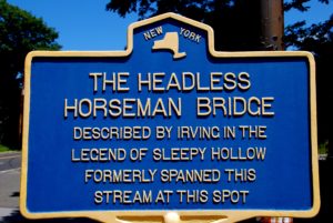 Most Haunted Towns in America - Headless Horseman Bridge Sign in Sleepy Hollow, NY