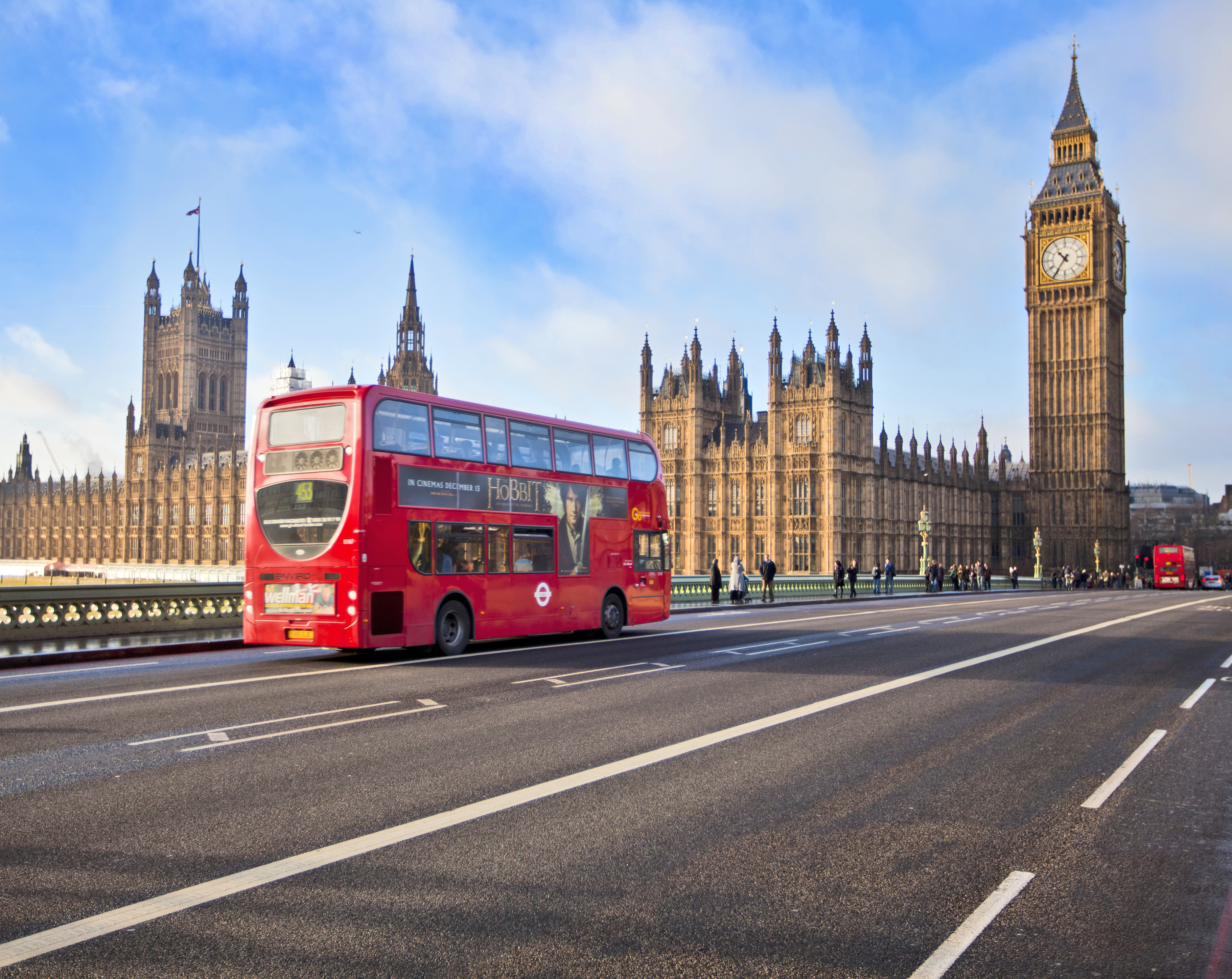 Experience a Fabulous Vacation in London with Family in 6 Days - Red Bus on Westminster Bridge in London