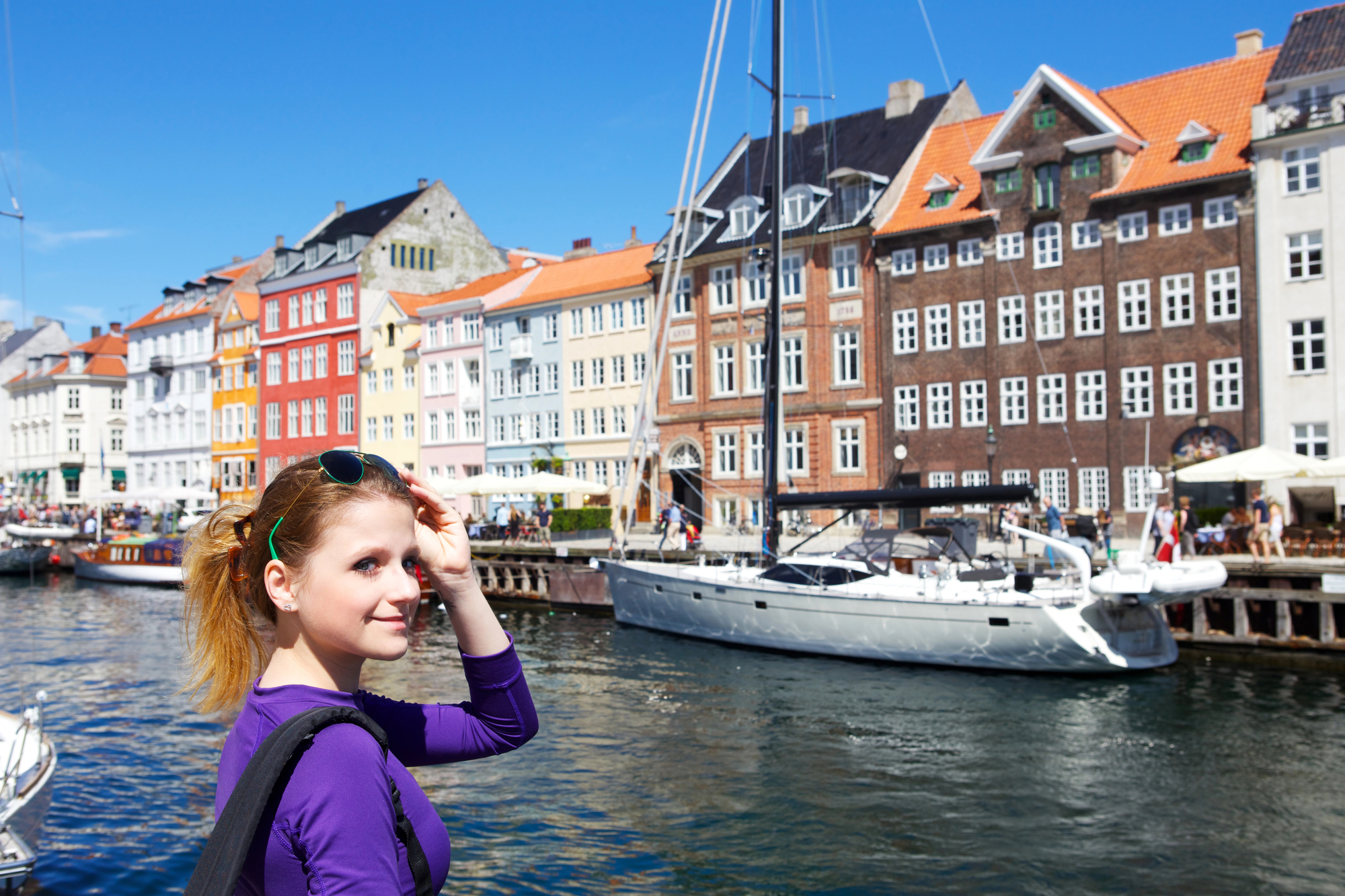 Best Places for Single Women to Travel - Solo Female Traveler in Nyhavn in Copenhagen, Denmark