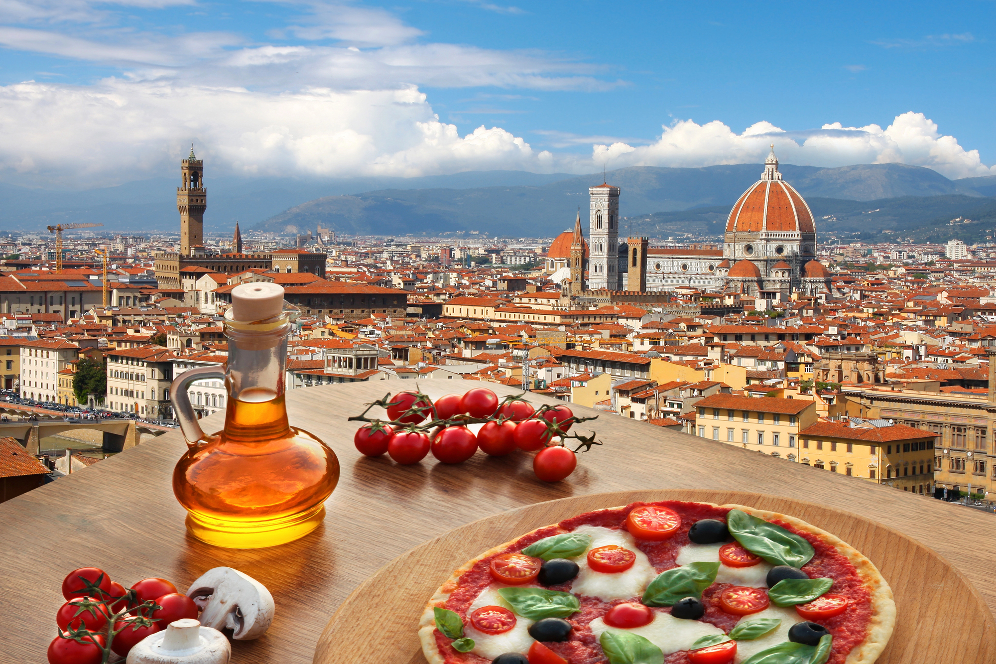 Top Destinations for Solo Female Travelers Who Love Food and Wine - Meal Overlooking the City of Florence, Italy