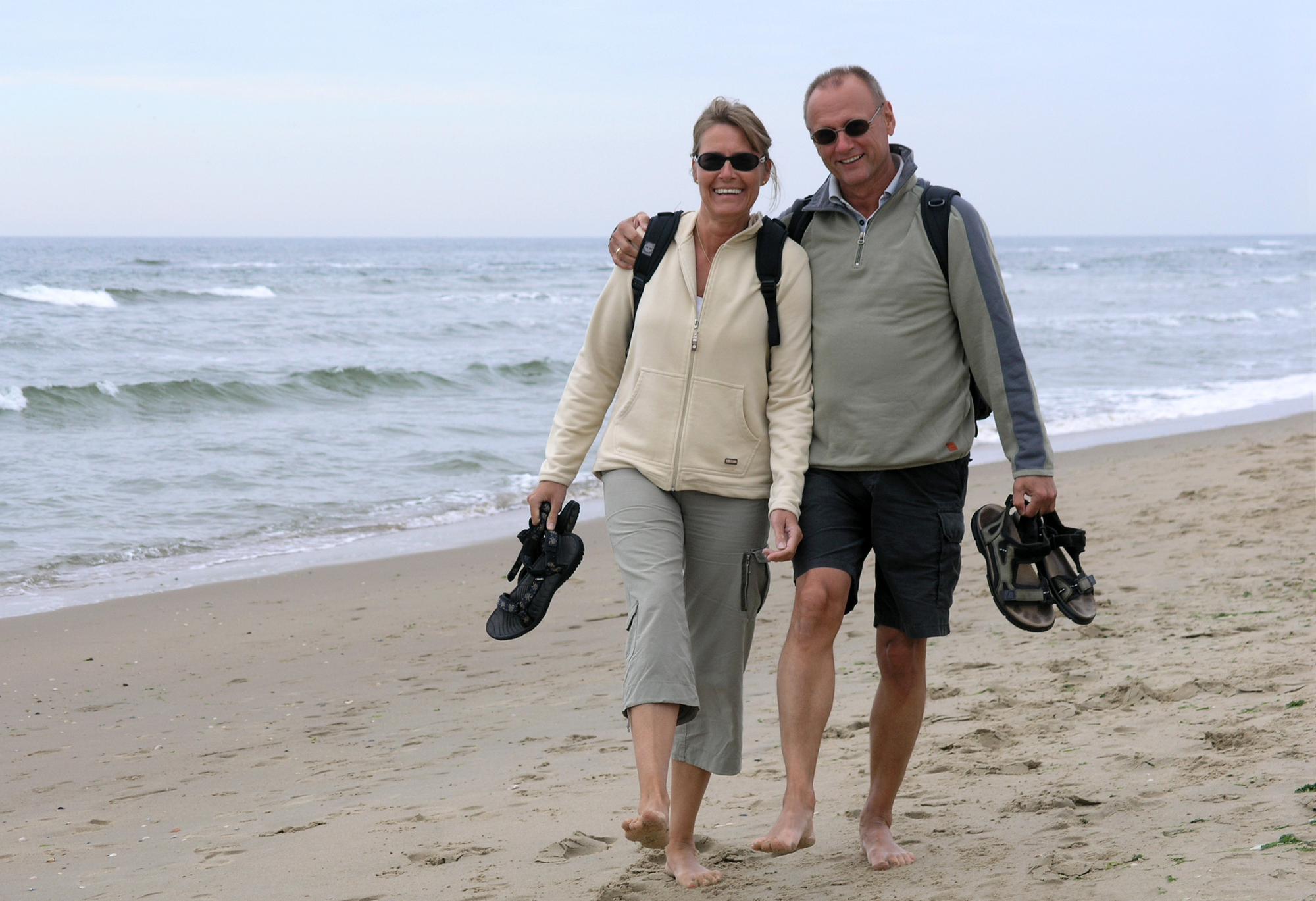 Adventure Trips for Empty Nesters: Rediscover Your Wild Side - Empty Nester Couple Running on the Beach