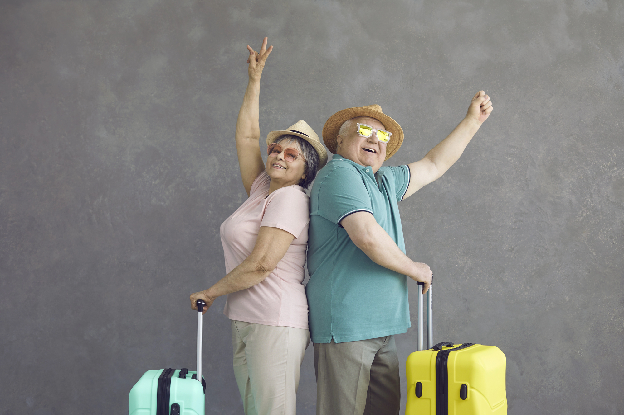 Reasons to Embrace Empty Nesters Travel - Senior Empty Nester Couple Packed and Ready to Travel the World