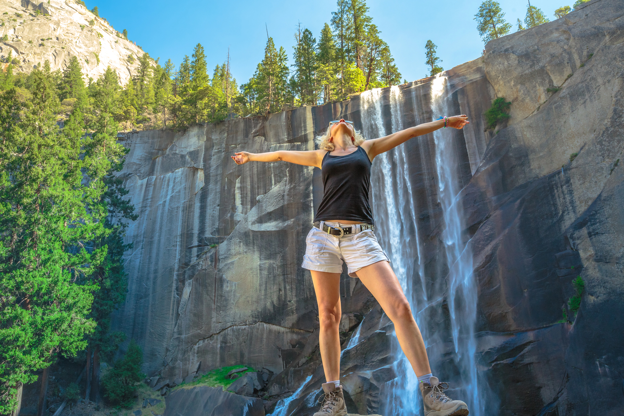 Best Hiking Trails for Solo Female Travelers: Safe, Scenic, and Empowering Adventures - Solo Female Hiker at Vernal Falls in Yosemite National Park