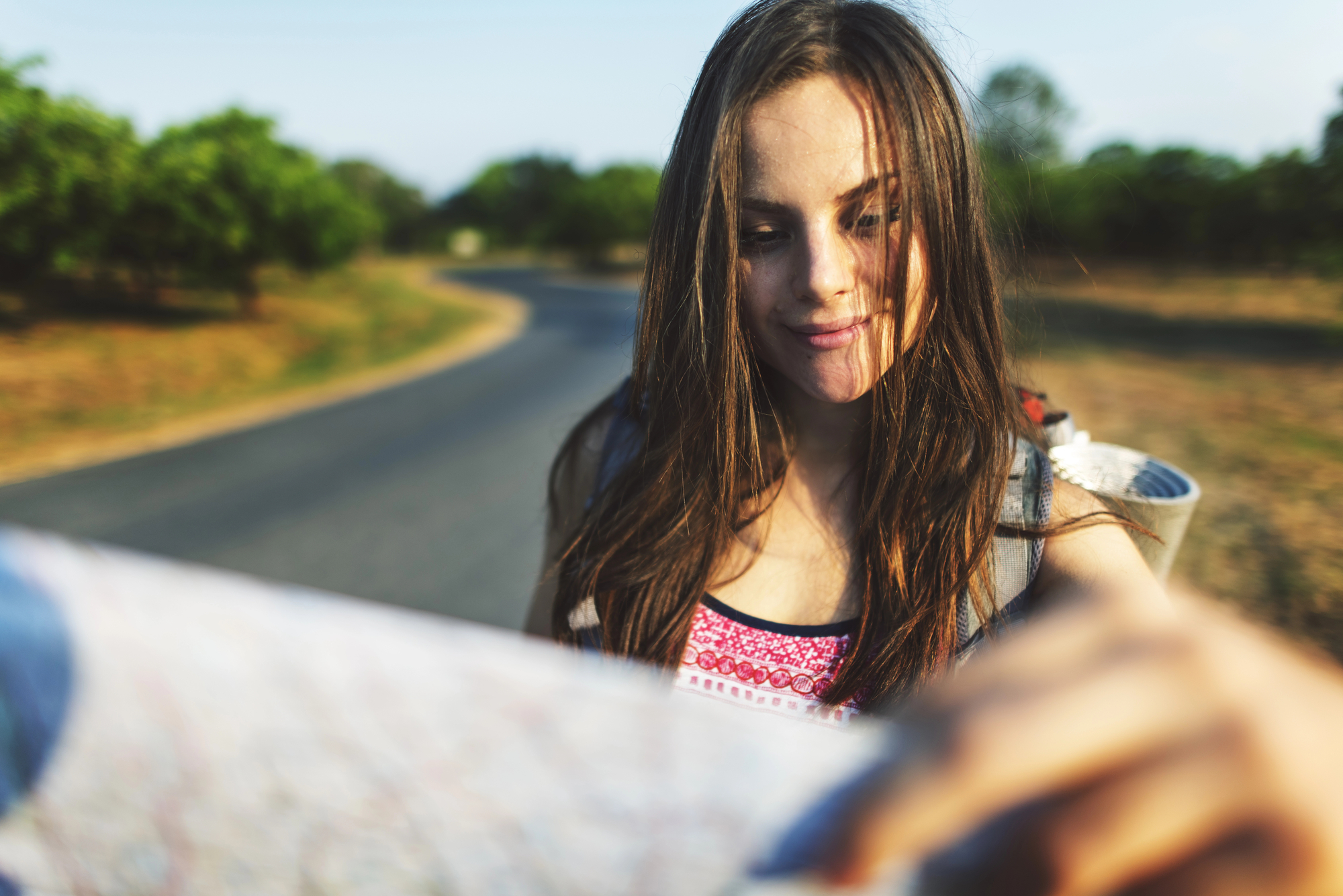 Best Cities in the US for Solo Women Travelers: Safe, Fun, and Empowering Getaways - Solo Female Traveler Reading a Map