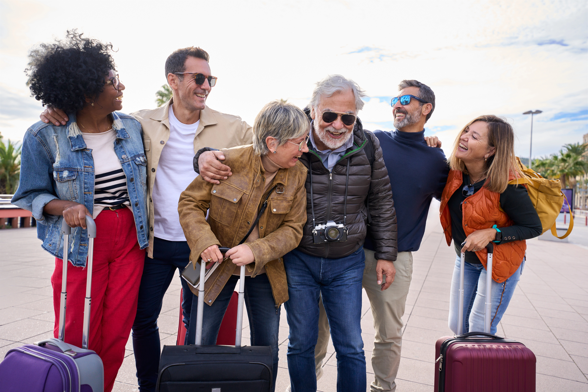 Is Facebook Group Travel Safe? Here’s What You Should Know - group of travelers with luggage