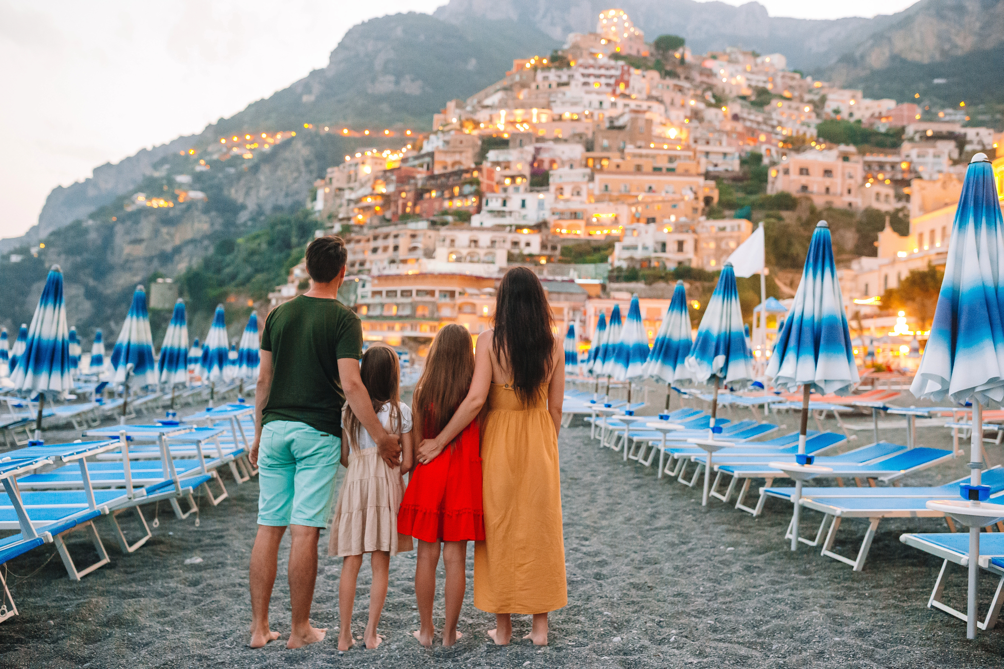 Life is Short and the World is Big: Why Milestone Moments Deserve Milestone Travel - Family in Positano Village in Italy